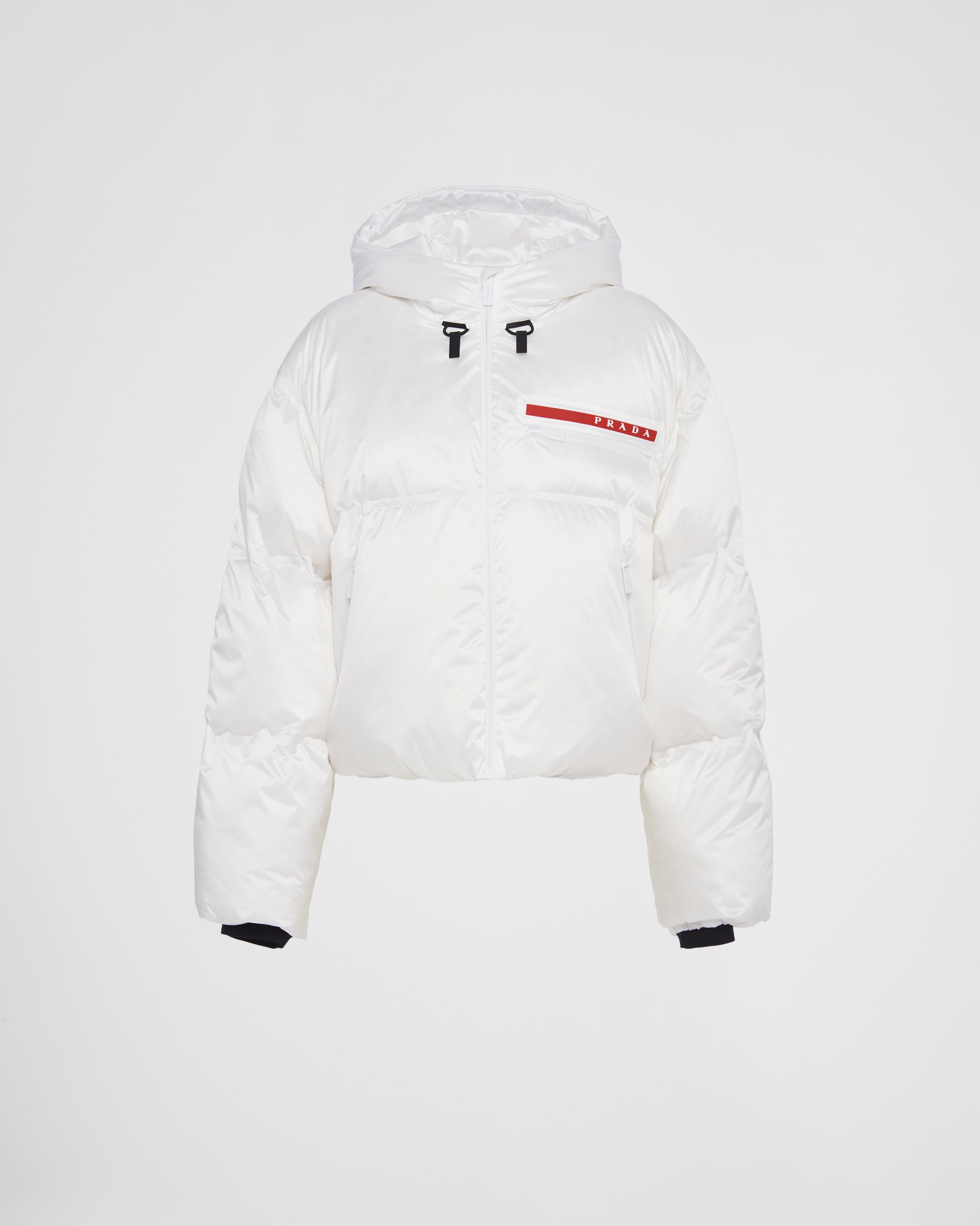 

Укороченная пуховая куртка из технического переработанного нейлона Prada, белый