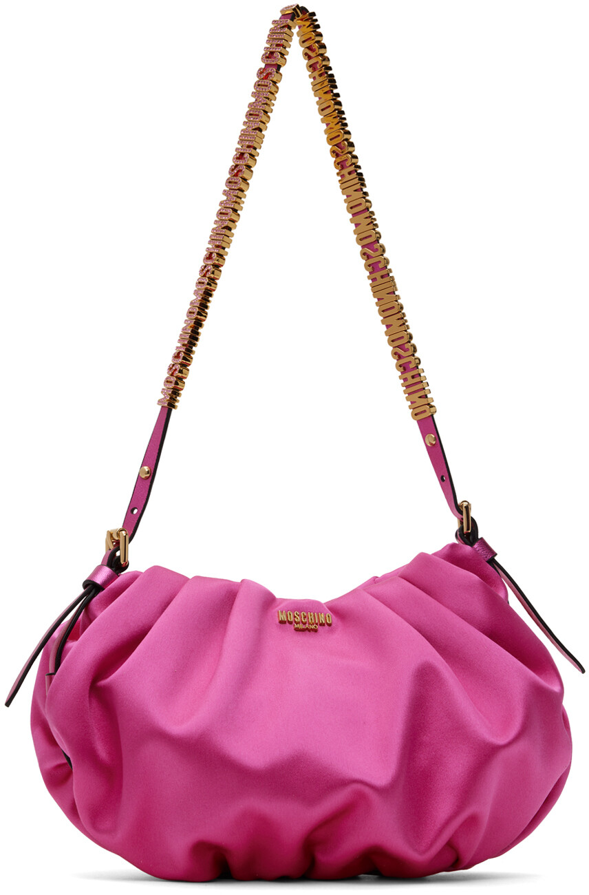 

Розовая мини-сумка с надписью Moschino