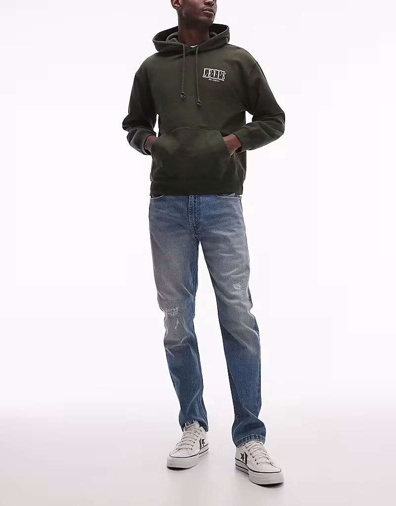 

Джинсы Levi's 515 slim taped fit с потертостями, средневыбеленные