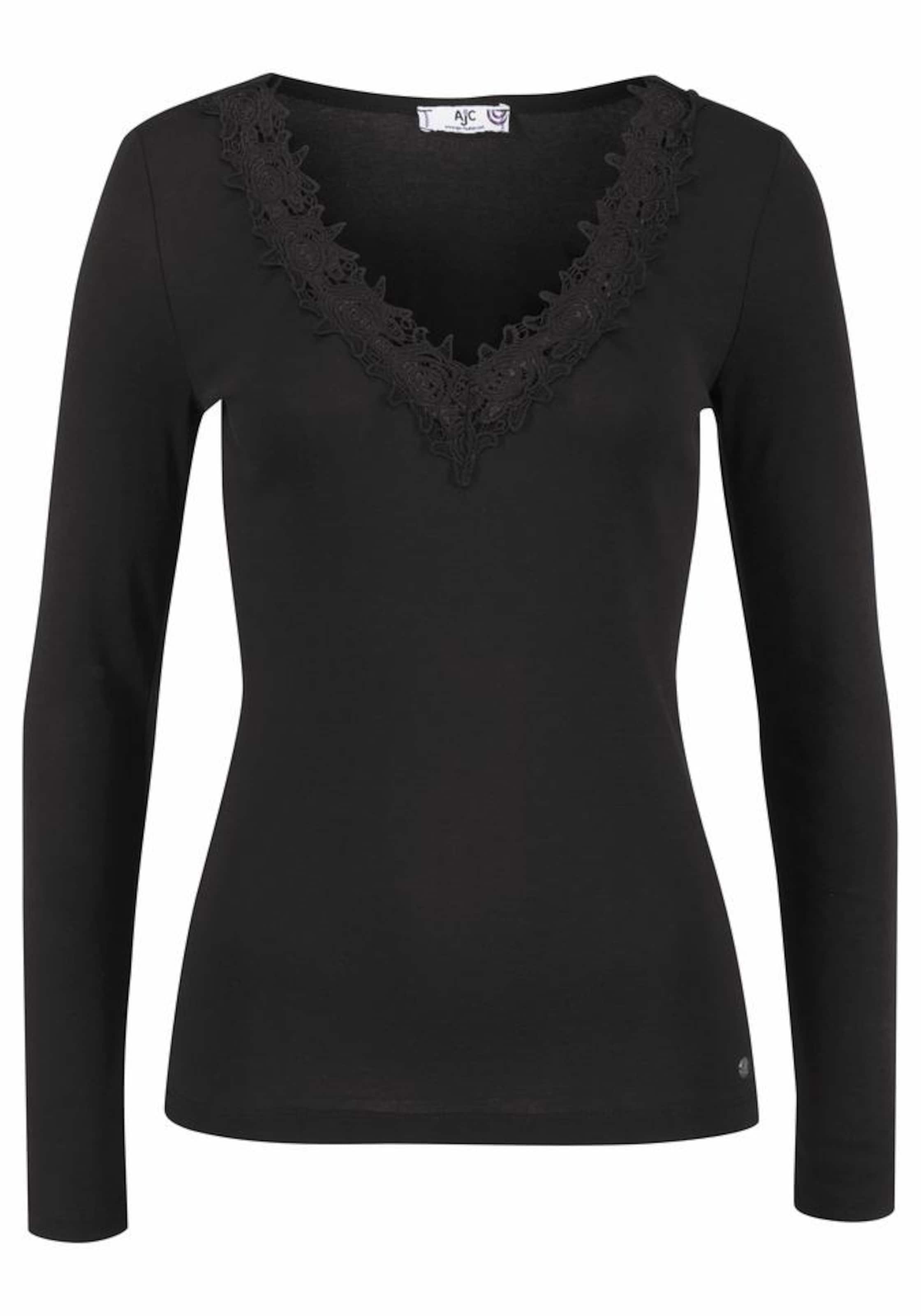 

AJC Лонгслив в черном цвете