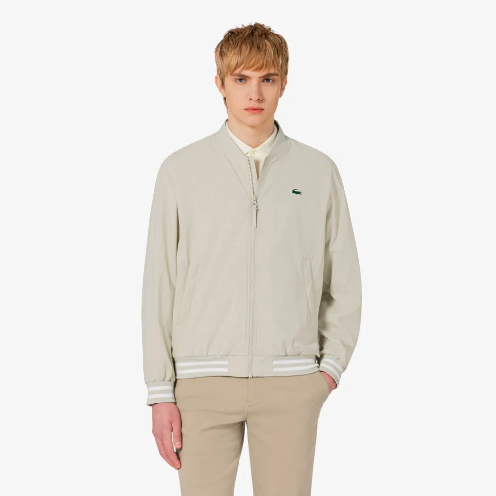 Мужская бежевая весенняя куртка-бомбер от Lacoste — фото 4