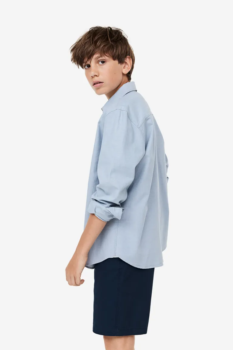 

Хлопчатобумажную рубашку H&M, синий