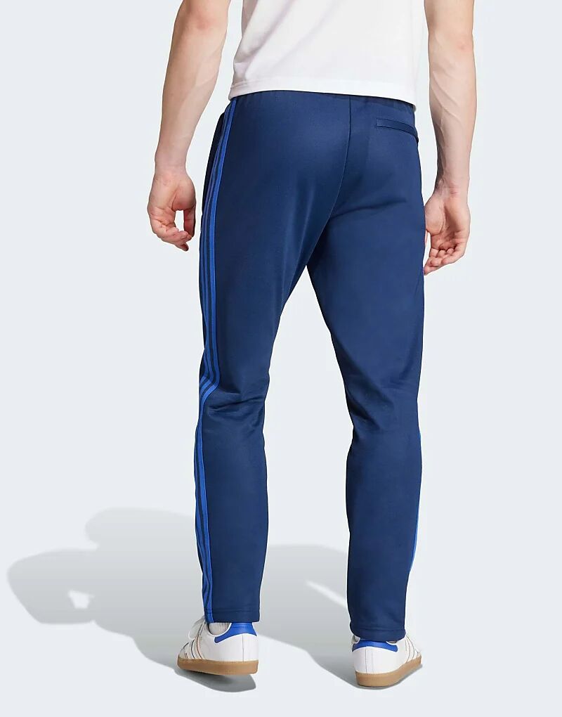 

Темно-синие спортивные брюки adidas Originals Olympique Lyonnais Annual