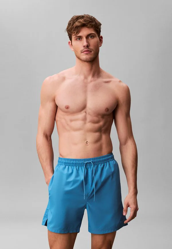 

Плавки средней длины с завязками на поясе, базовые модели. Calvin Klein Swimwear, Cendre Blue, Синий, Плавки средней длины с завязками на поясе, базовые модели. Calvin Klein Swimwear, Cendre Blue