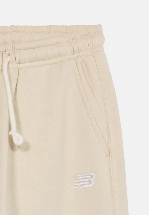 Спортивные штаны для девочек New Balance brushback small logo, бежевые — фото 4