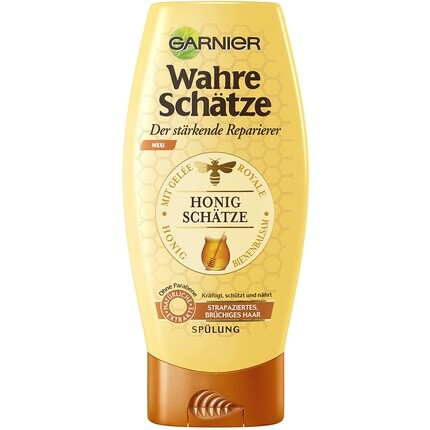 

Кондиционер Garnier True Treasures для интенсивного ухода за волосами укрепляет структуру волос с маточным молочком, пчелиным бальзамом и медом 200мл