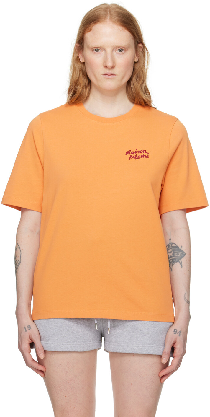 

Оранжевая футболка с почерком Maison Kitsune