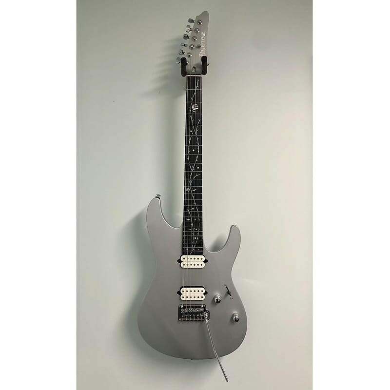 

Электрогитара Ibanez TOD10-CSV Tim Henson Signature 2022 - Present - Classic Silver