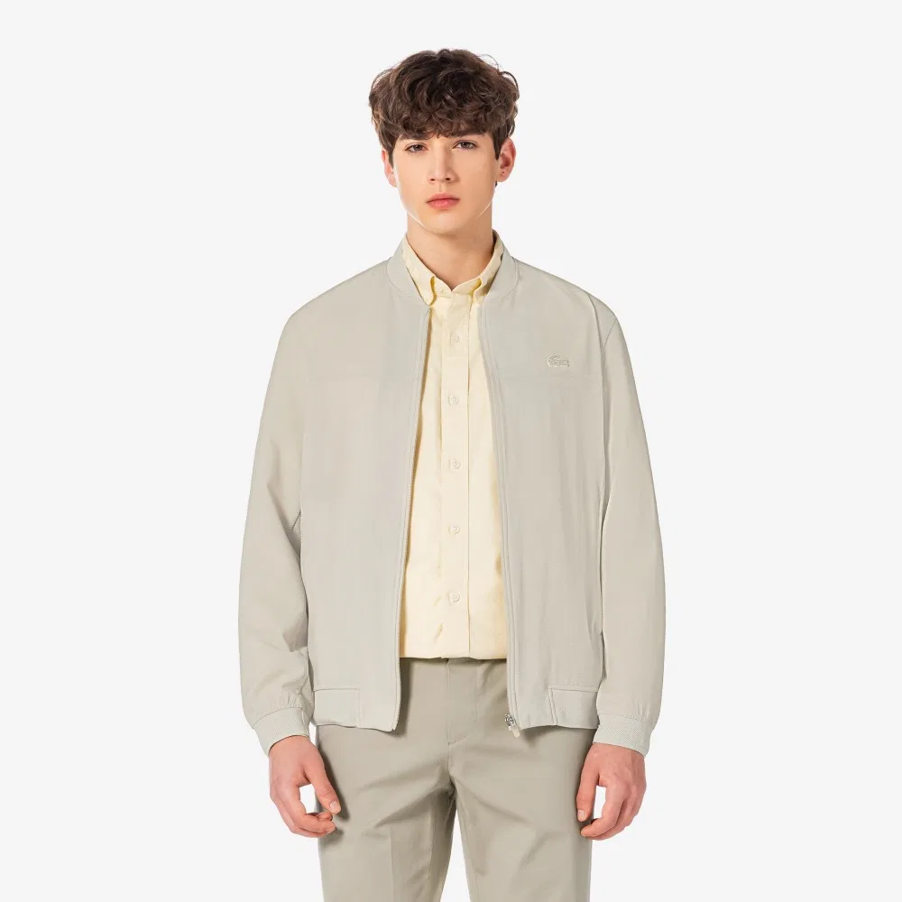 Мужская летняя куртка для гольфа бежевая от Lacoste — фото 4
