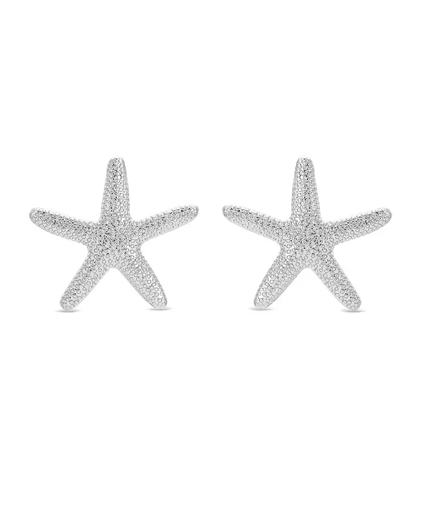 

Эффектные серьги-подвески в виде морских звезд Ettika, silver