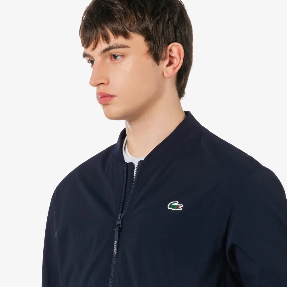 Мужская весенняя куртка-бомбер тёмно-синяя от Lacoste — фото 2