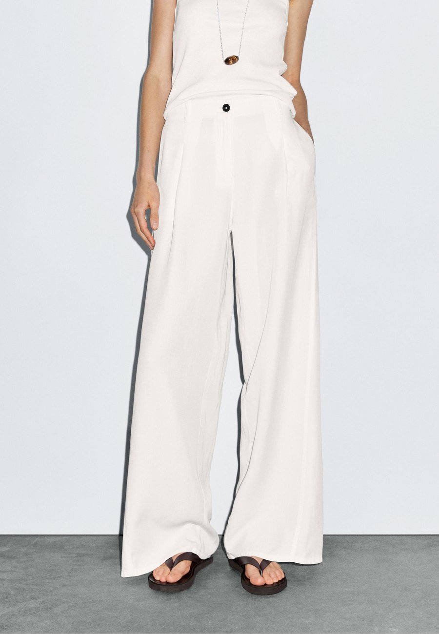 

Брюки Massimo Dutti FLOWING BARREL FIT WITH SEAM DETAIL, White