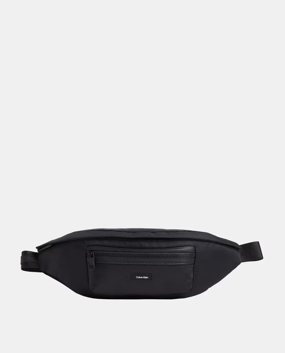 

Большая поясная сумка Essential из переработанных материалов черного цвета Calvin Klein