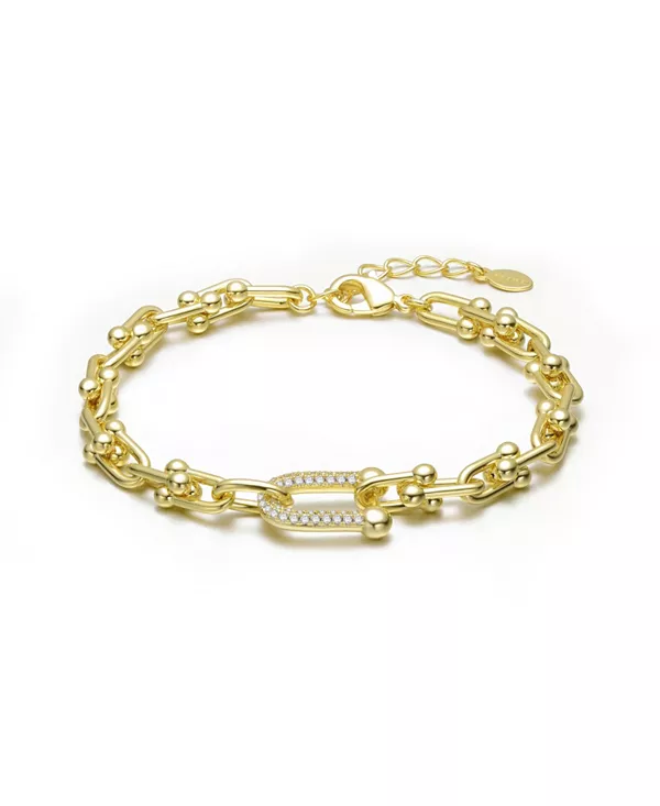 

Браслет в виде подковы с покрытием из 14-каратного золота и прозрачными кубическими цирконами. Rachel Glauber, gold