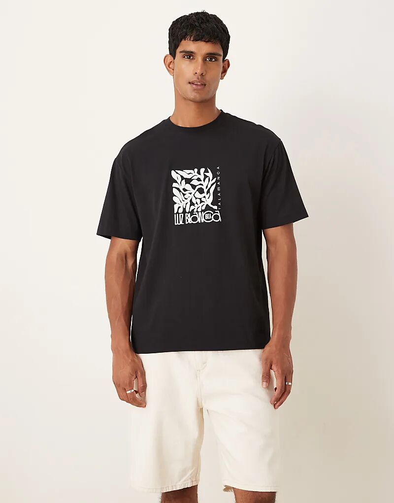 

Свободная футболка ASOS DESIGN с цветочным принтом на груди черного цвета