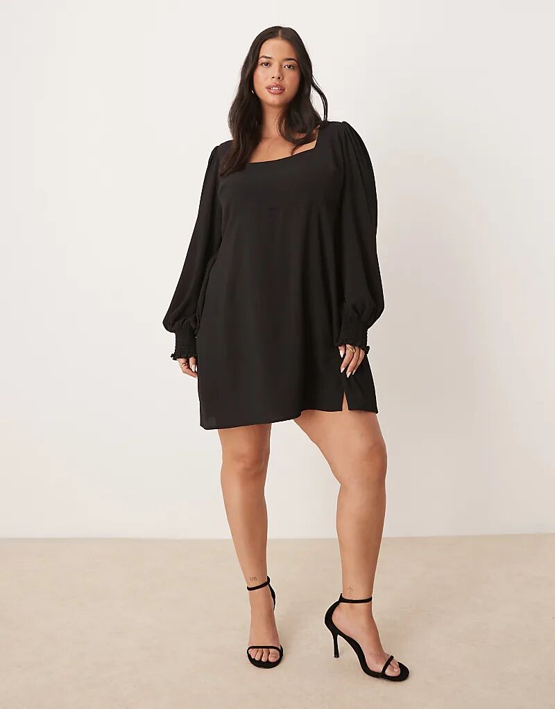 

Черное мини-платье с длинными рукавами и завязками на спине от ASOS DESIGN Curve Asos Curve