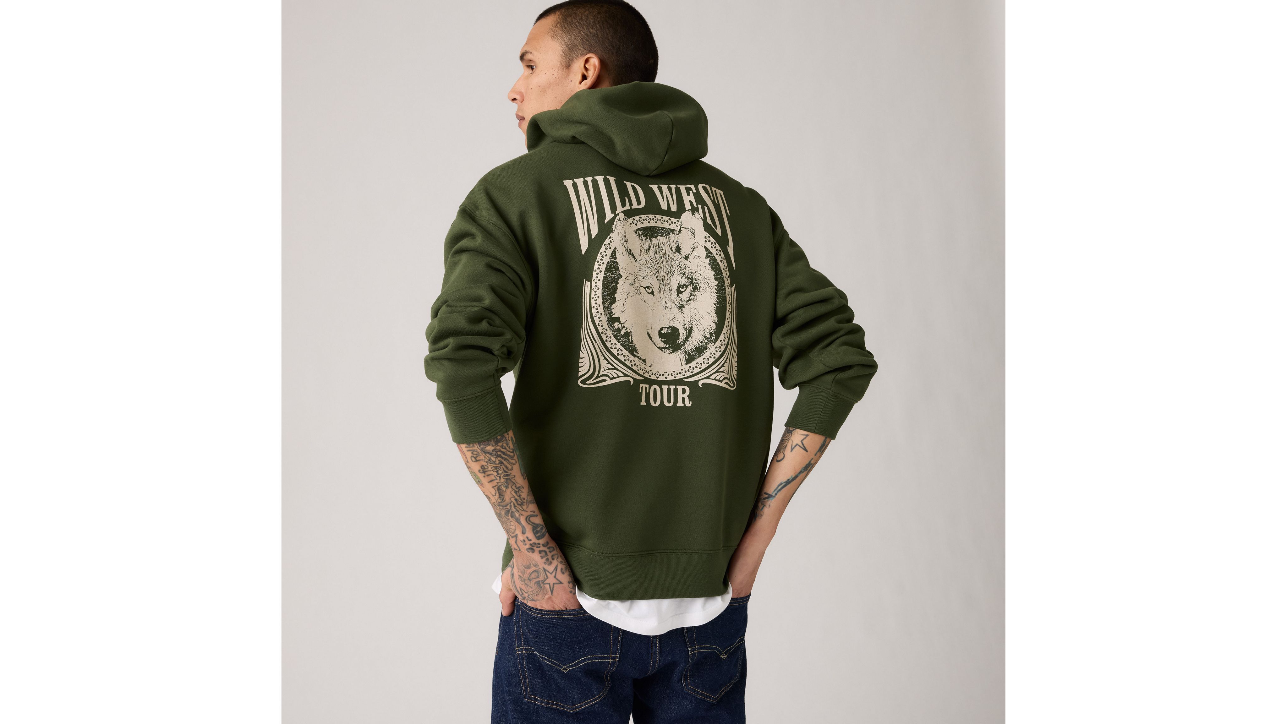 

Свободная толстовка с капюшоном и графическим принтом Levi's, Wild West Tour Duffel Bag - Green