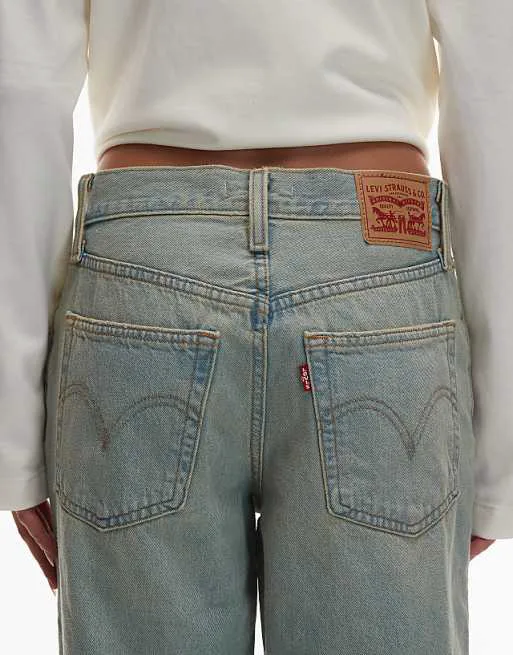 Легкие винтажные джинсы Levi's свободного кроя с рваными краями — фото 4