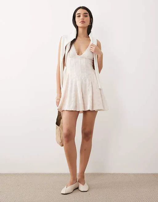 

Бежевое мини-платье мини с v-образным вырезом и корсетом Free People