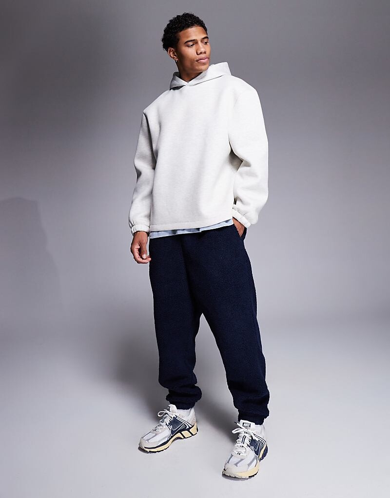 

Темно-синие джоггеры свободного кроя ASOS DESIGN
