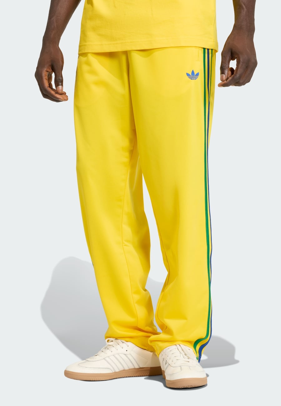 Брюки свободного кроя ADIDAS ORIGINALS Firebird, желтый — фото 2