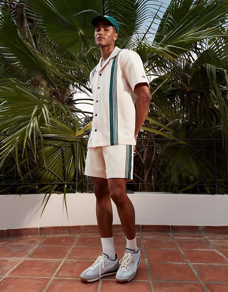 

Трикотажные шорты с полосками и логотипом бежевого цвета Alma De Ace