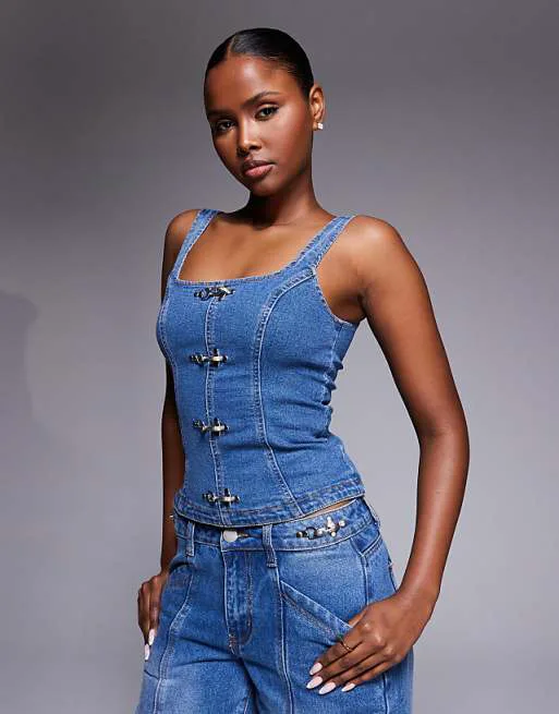 

Джинсовый корсет синего цвета с пряжкой Liquor N Poker