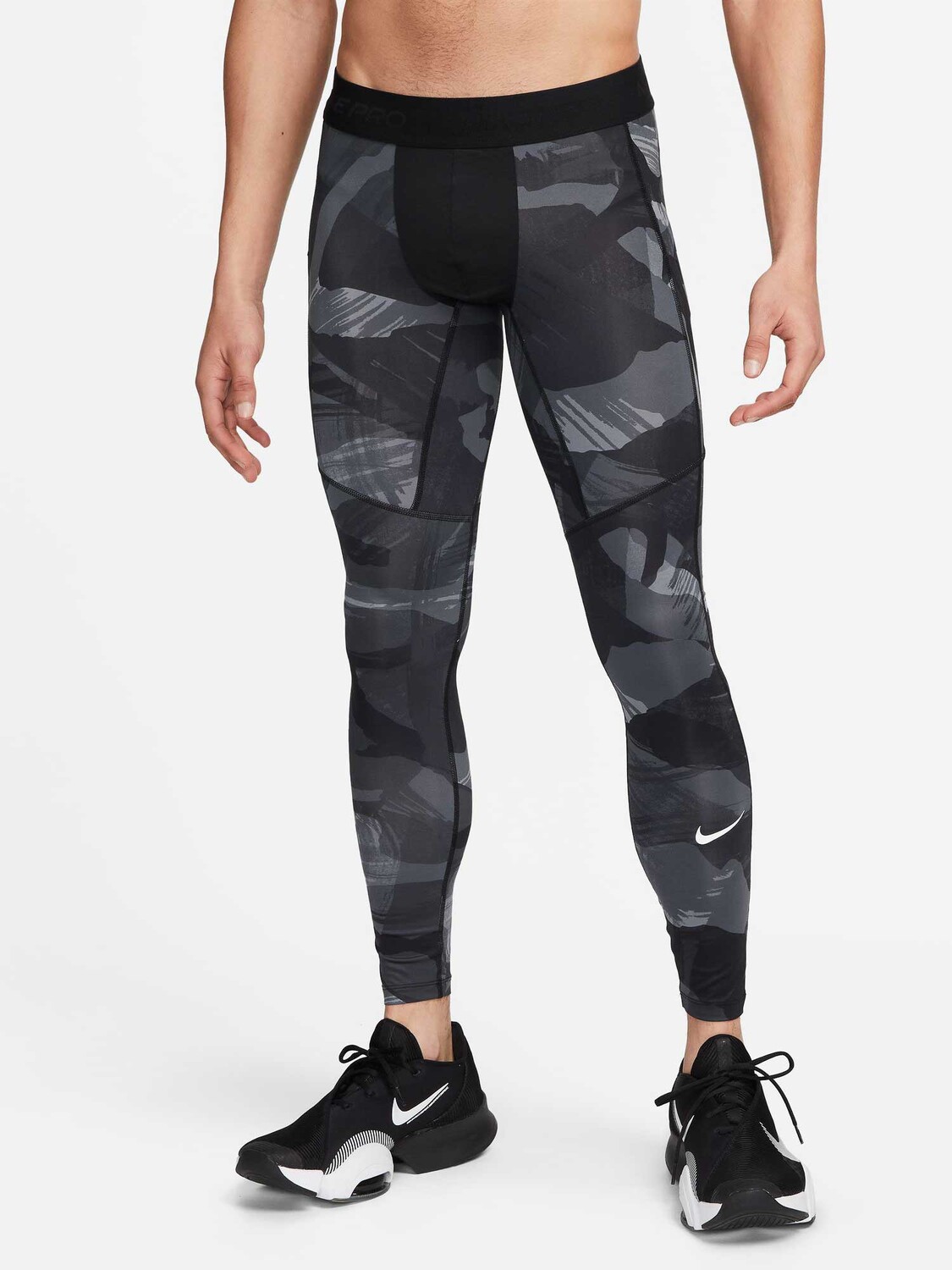 

Тайтсы Nike M NP DF TIGHT CAMO AOP, черный