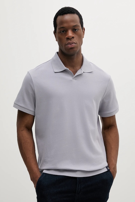 

Хлопковая поло Calvin Klein Jeans, фиолетовый