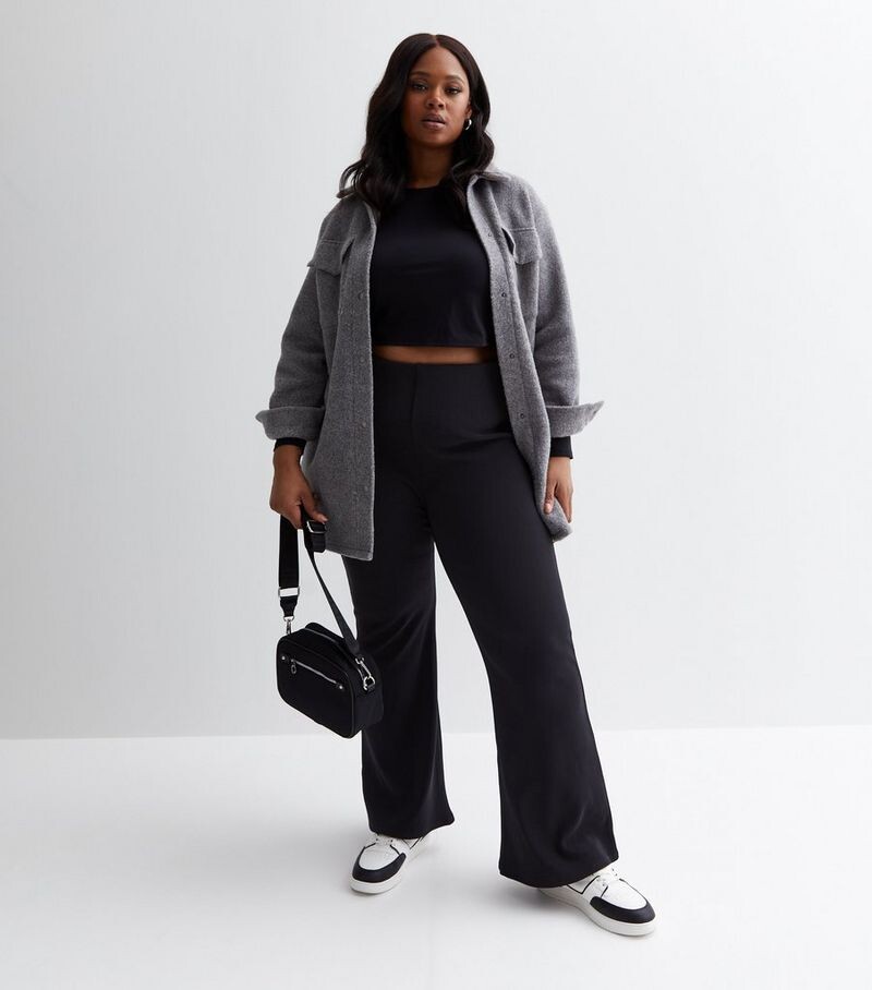 

Черные расклешенные брюки в рубчик Curves New Look, черный