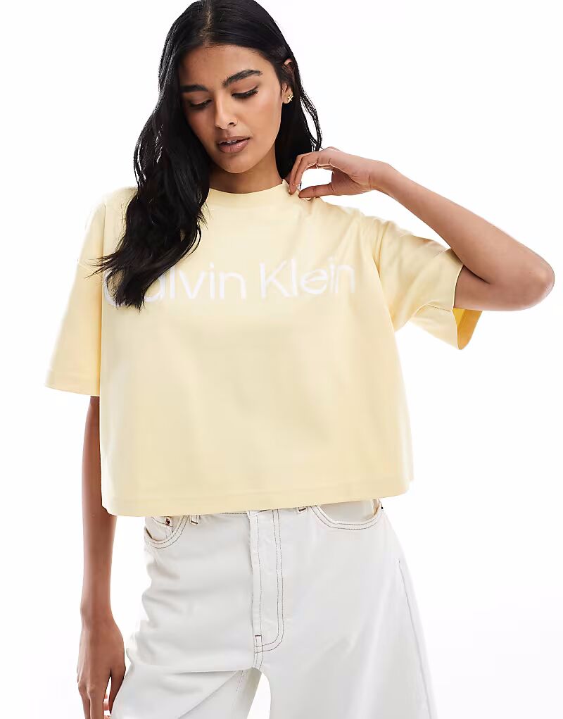 

Футболка свободного кроя с большим логотипом Calvin Klein Jeans желтого цвета