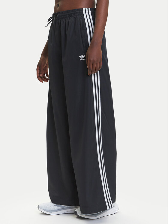 

Свободные спортивные штаны adicolor Firebird JD3390 Adidas, черный