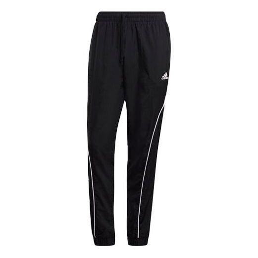 

Спортивные штаны adidas Unisex M Favs Logo Printing Woven Trousers Black, черный
