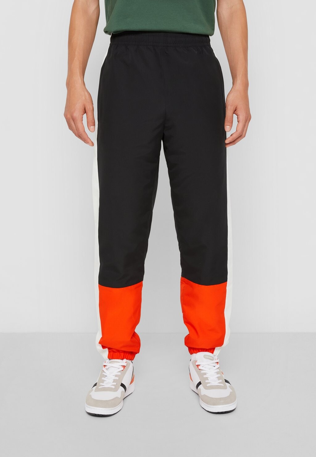 

Спортивные брюки Exclusive Lacoste, цвет black/flour/sunrise