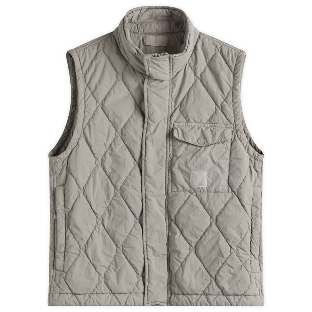 

Жилет Ghost Piece из нейлона сэнд с наполнителем Primaloft Stone Island, цвет dust