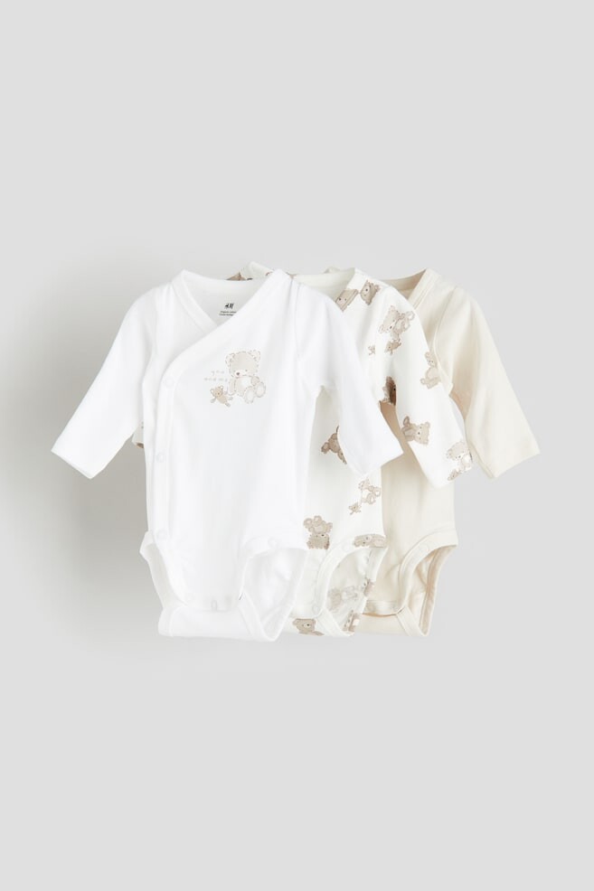 

В упаковке 3 боди с запахом H&M, белый