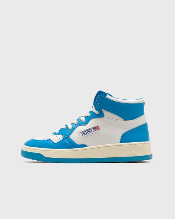 

Кроссовки Autry Action Shoes Wmns Medalist Mid, цвет leat/leat wht/cobalt