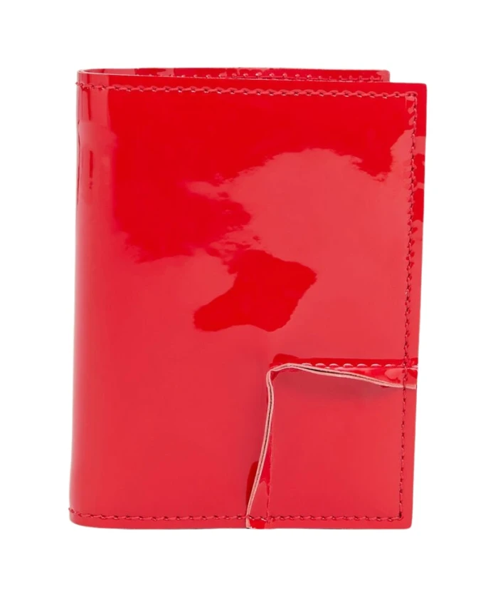 

Кошелек из лакированной кожи складывающийся в два раза Comme Des Garçons, красный