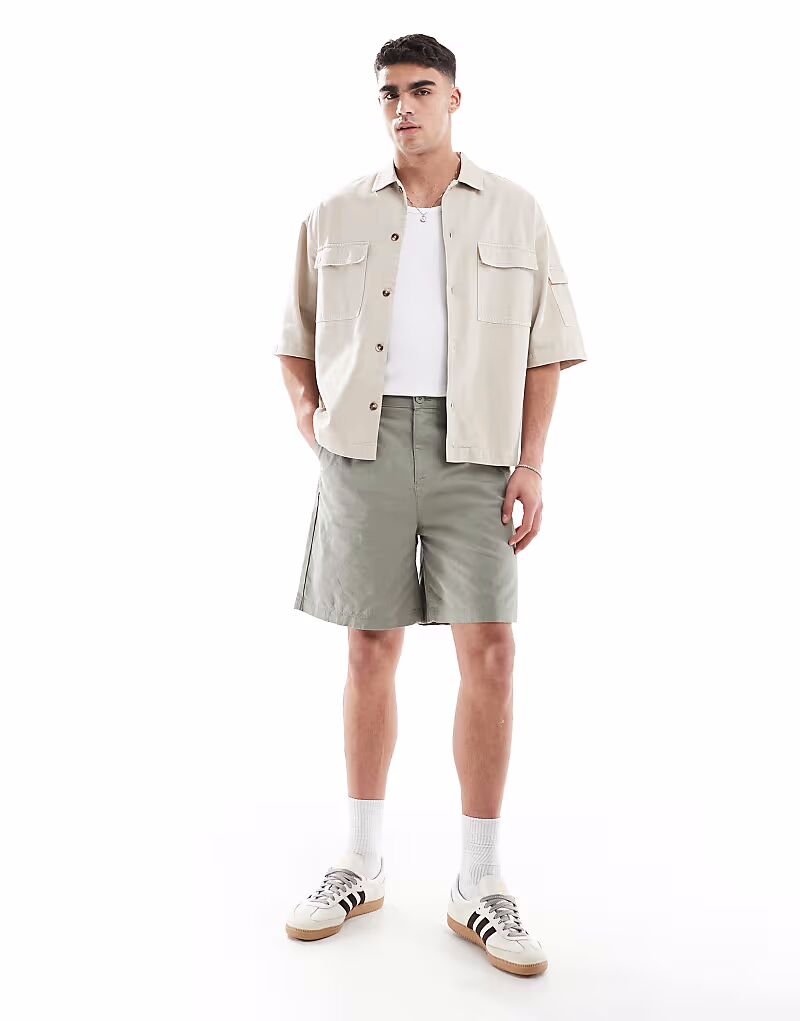 

Льняные шорты средней длины цвета хаки ASOS DESIGN