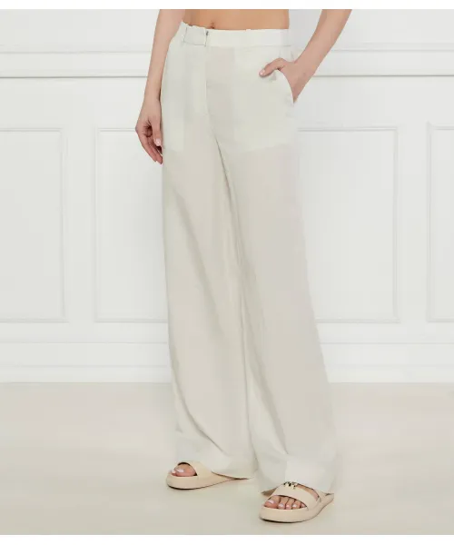 

Брюки Flare fit Calvin Klein, бежевый
