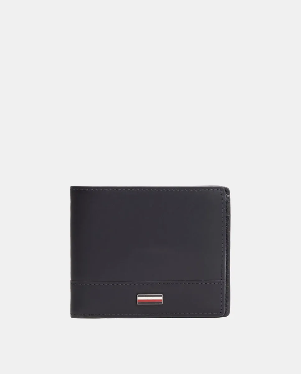 

Большой мужской кожаный кошелек с фирменной символикой Tommy Hilfiger, тёмно-синий
