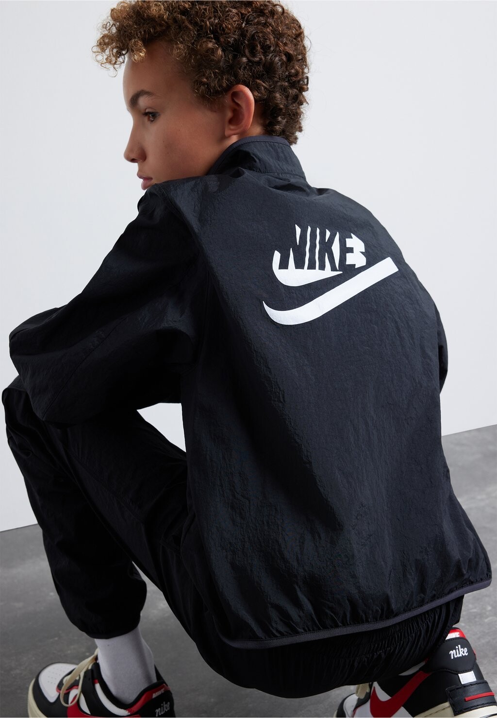 

Спортивный костюм TRACKSUIT UNISEX SET Nike Sportswear, цвет black/white