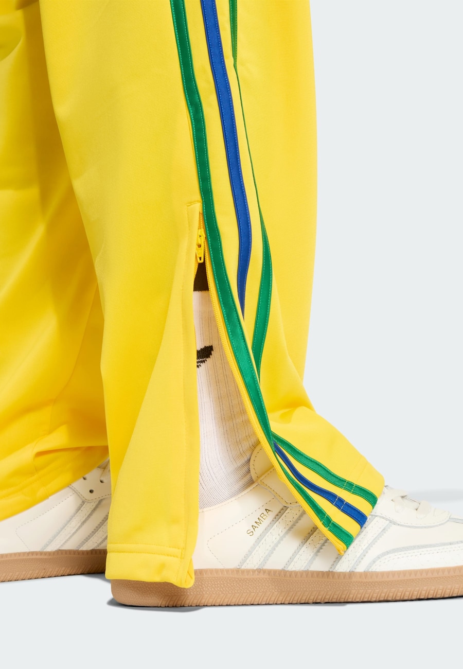 Брюки свободного кроя ADIDAS ORIGINALS Firebird, желтый — фото 4
