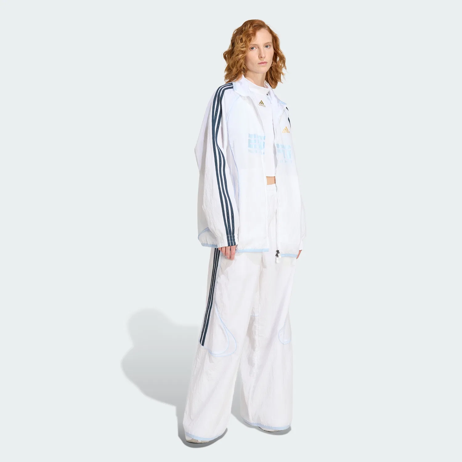 Женская спортивная куртка Teamgeist 2.0 Track Top белого цвета от Adidas — фото 3