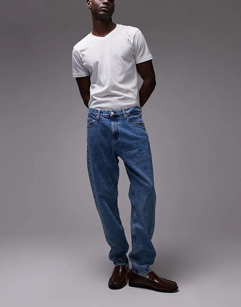 

Свободные зауженные джинсы Tommy Jeans Isaac светлого оттенка