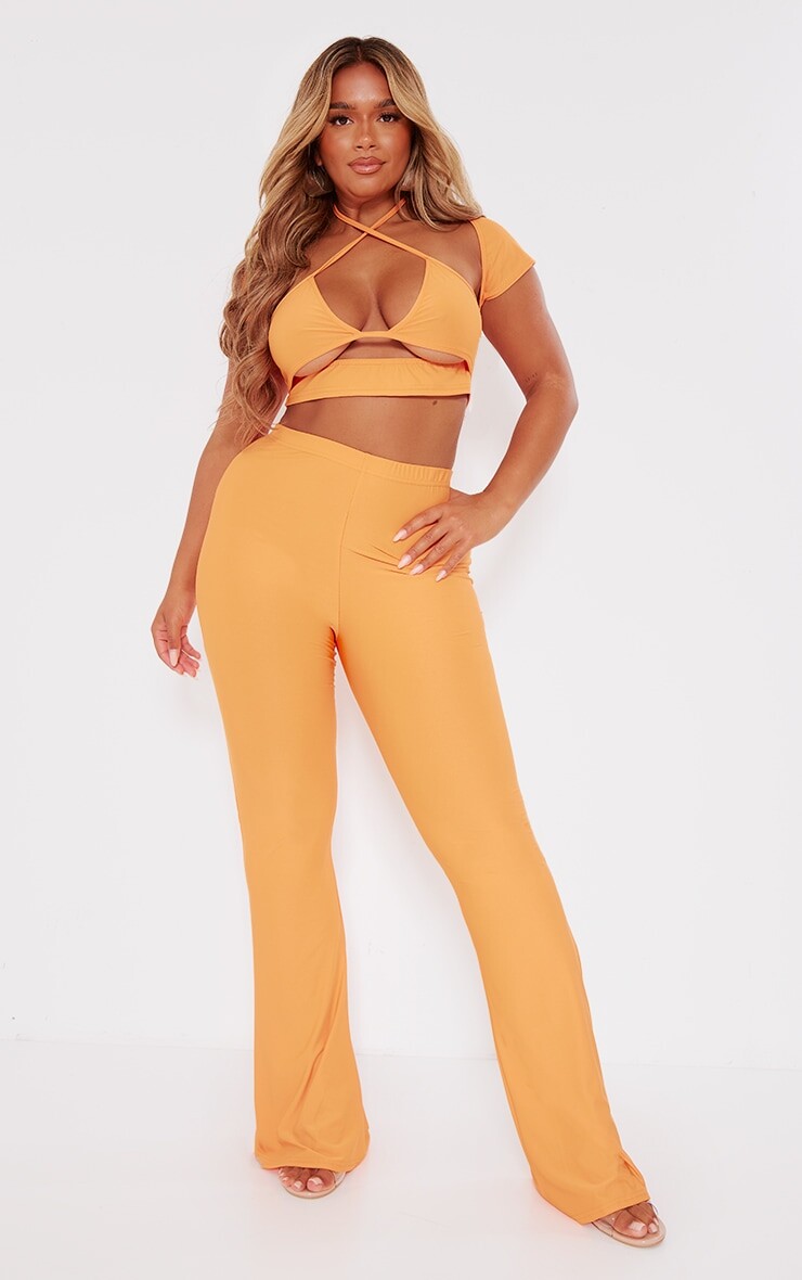 

PrettyLittleThing Оранжевые обтягивающие расклешенные брюки с низкой посадкой Shape, Оранжевый, PrettyLittleThing Оранжевые обтягивающие расклешенные брюки с низкой посадкой Shape
