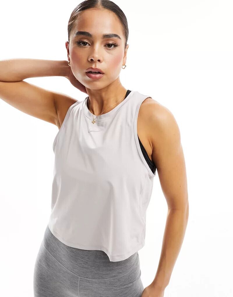 

Светло-фиолетовая узкая укороченная майка Nike One Dri-Fit