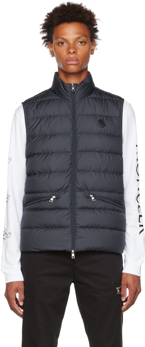 

Темно-синий стеганый пуховый жилет Moncler