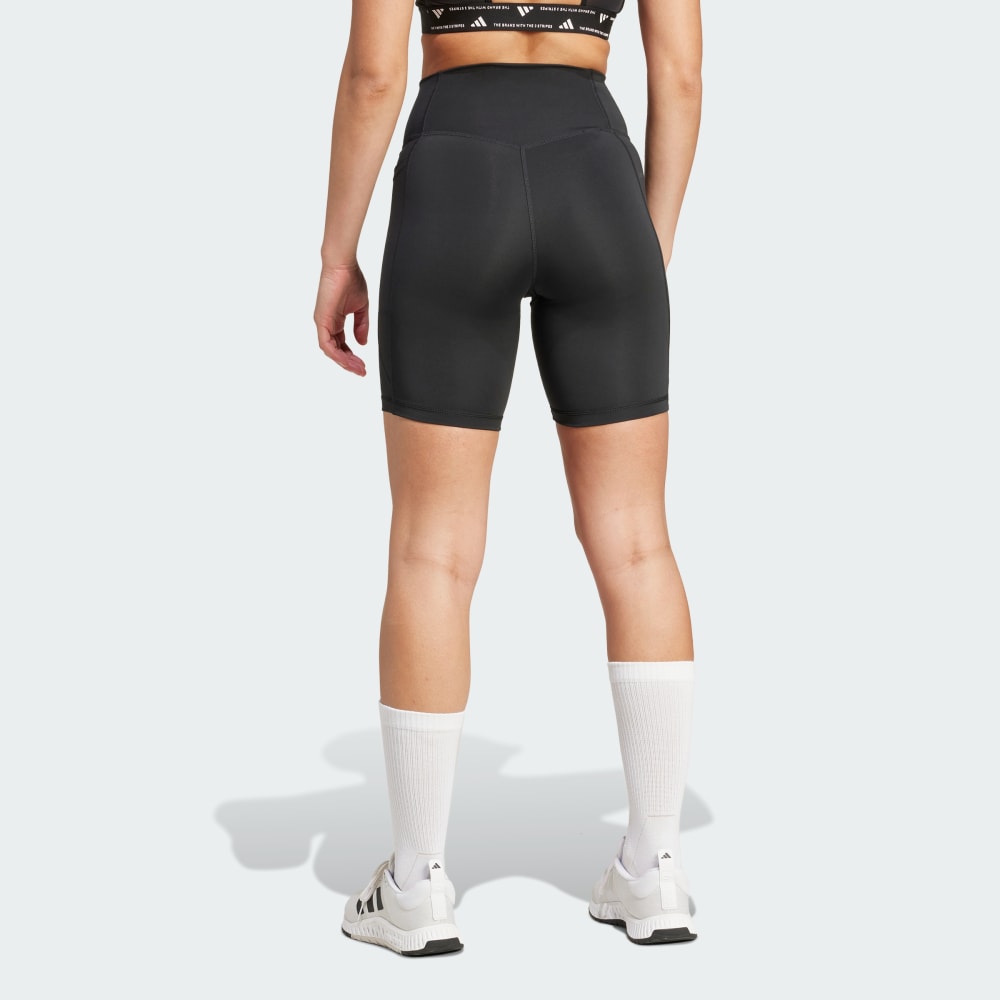 Спортивные шорты-леггинсы Adidas Optimé Essentials Stash Pocket 7-Inch Short Leggings, черный — фото 2