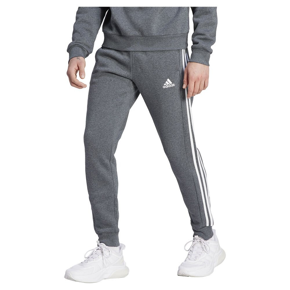 

Джоггеры adidas Essentials Fleece 3 Stripes Tapered Cuff Joggers, серый